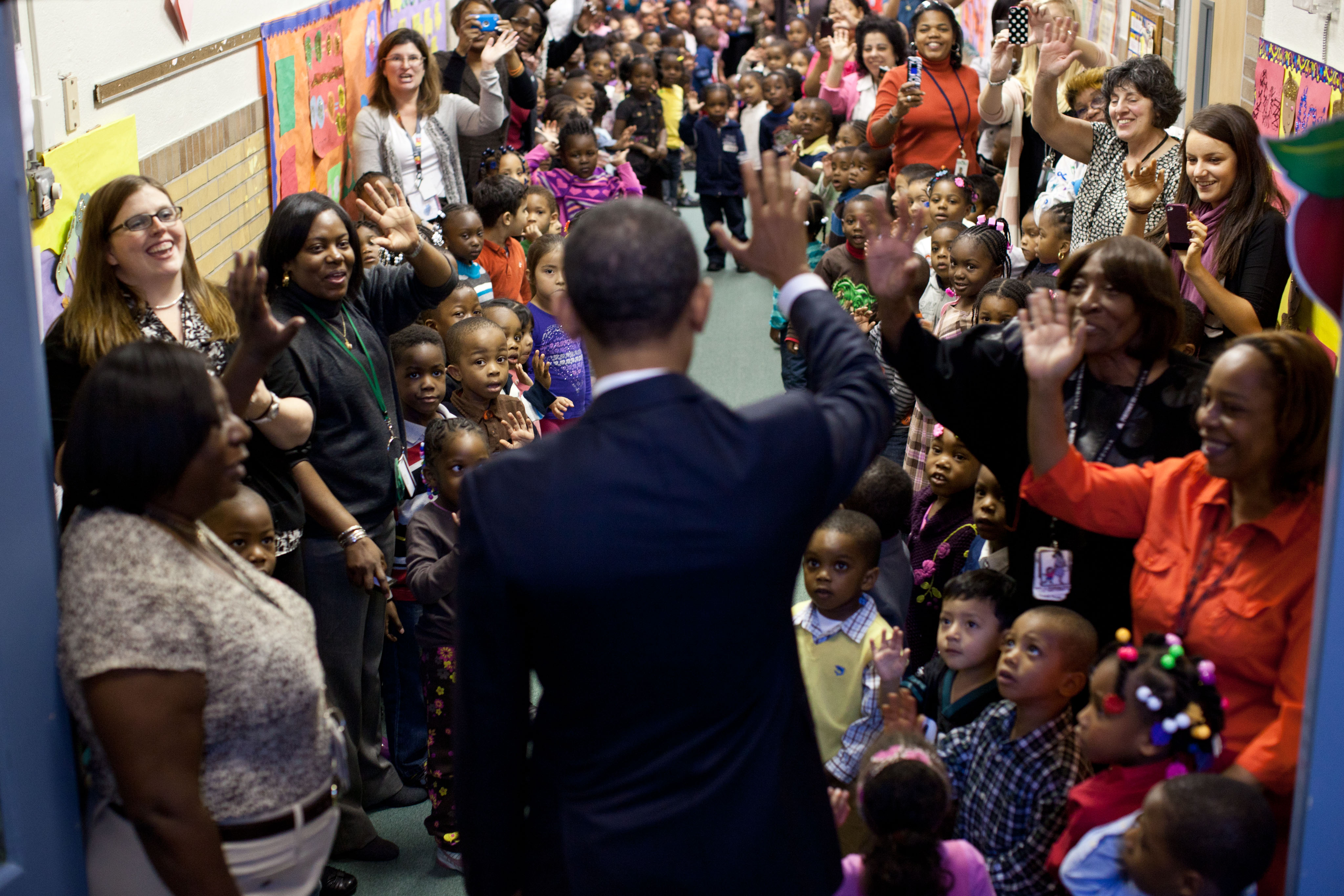 President Obama says goodbye to students after a visit to the Yeadon Regional Head Start Center